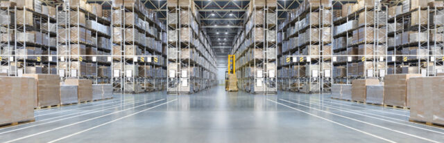 Huge,Distribution,Warehouse,With,High,Shelves,And,Loaders.,Bottom,View.